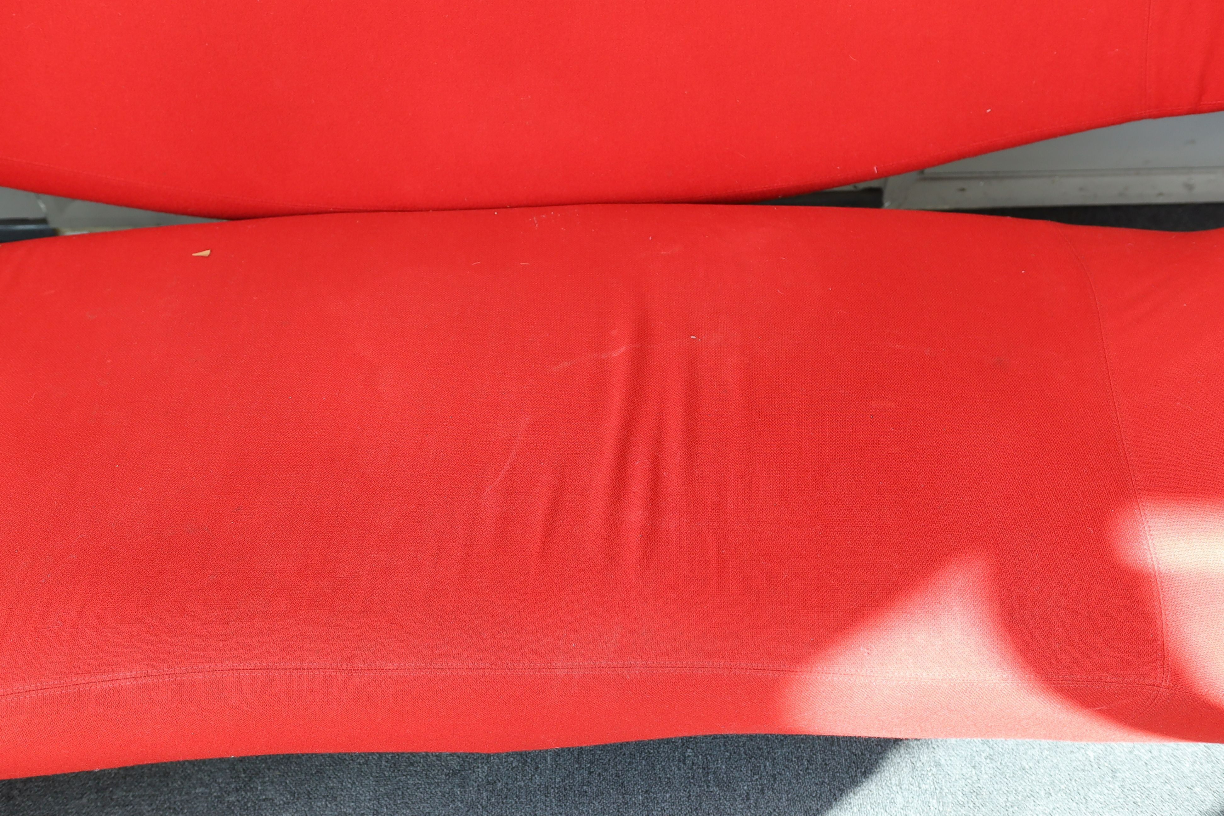 A Ron Arad, 'Moroso' sofa upholstered in red fabric, length 240cm, depth 94cm, height 100cm